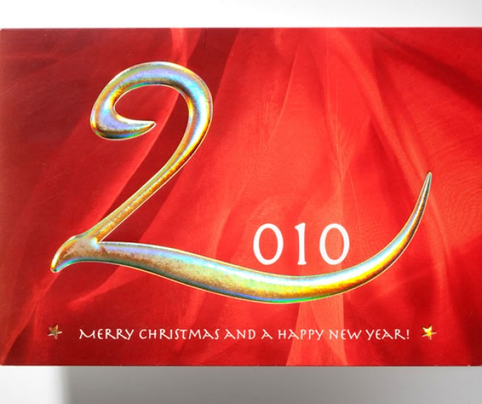 Образец тиснения фольгой, конгревного тиснения и выборочной УФ-лакировки на примере новогодней открытки